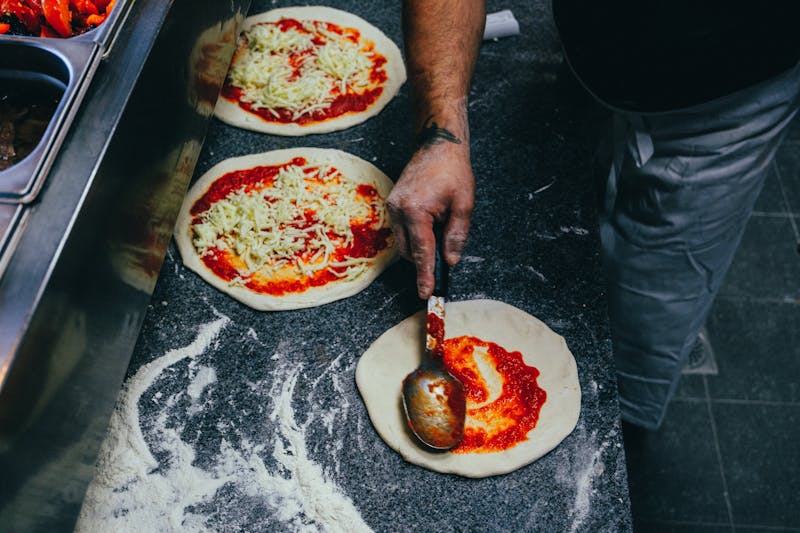 Marcos restaurant kitchen preparing marco's pizza